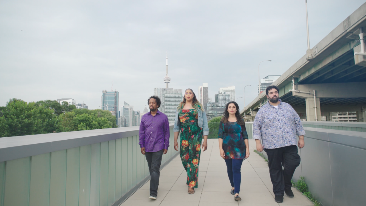 Photos of BOUND soloists (Justin Welsh, Breanna Sinclairé, Miriam Khalil, and Andrew) walking down a cement ramp with Toronto skyline in the background.
